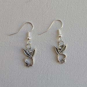 Silver playboy bunny dangle earrings